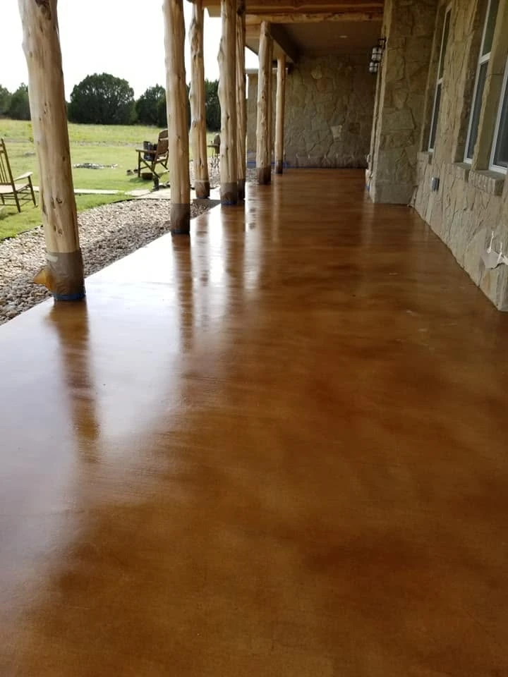 Richly stained decorative concrete patio in Austin